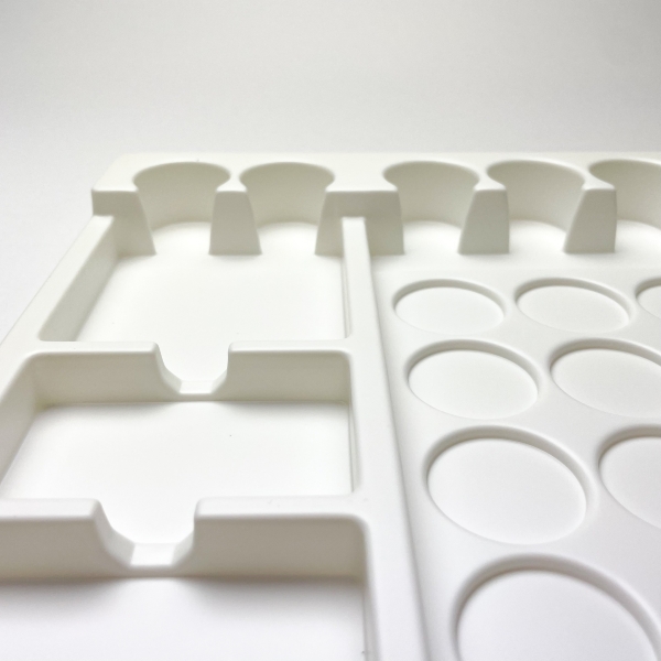 Termoformirana plastična embalaža, vložek.